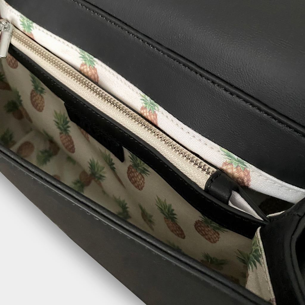 Rahui London Black Apple Leather Vegan Shoulder Bag Inside View with pineapple print lining